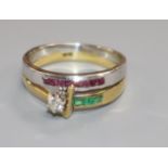 A modern two colour 18ct gold, diamond and gem set dress ring, size P/Q