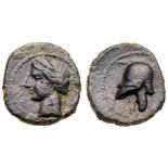 Iberia, Punic issues. Æ (1.58 g), ca. 237-209 BC. Laureate head of female left. Reverse: Helmet