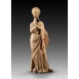 Weibliche Statuette mit Diadem. Weibliche Statuette mit Diadem. 1. Jh. v. Chr. Hellroter Ton, H