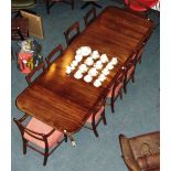 A GOOD QUALITY REGENCY STYLE MAHOGANY TWIN PILLAR RECTANGULAR DINING TABLE with two extra leaves,