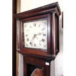 A PROVINCIAL OAK CASED 30-HOUR LONGCASE CLOCK the enamel dial with floral painted decoration to
