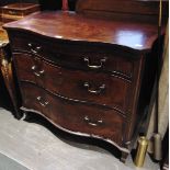 A GEORGE III INLAID MAHOGANY SERPENTINE FRONTED CHEST with brushing slide and three long graduated