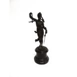 A BRONZE FIGURE OF A MAIDEN portraying Justice, on circular marble base, 26.5cm high