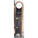 AN OAK CASED ELECTRIC WALL CLOCK the enamel dial in scribed 'SMITHS ENGLISH CLOCK SYSTEMS', 26cm