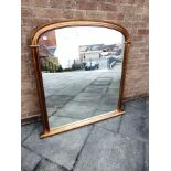 AN ARCHED OVERMANTLE MIRROR in painted gilt frame, height 123cm width 120cm