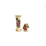 A ROYAL WORCESTER TRUMPET SHAPED VASE with painted floral decoration and gilt highlights, date stamp