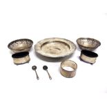 A SILVER ARMADA DISH 17cm diameter; a pair of silver bon bon bowls, pierced decoration; a pair of