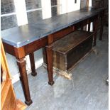 A LONG INLAID SIDE/SERVING TABLE with heavy slate top, three sprung loaded cutlery drawers below and