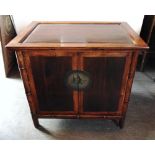 A CHINESE ELM AND BAMBOO SIDE CABINET with metal fittings, 101cm wide 68cm deep 94cm high