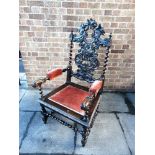A CAROLEAN STYLE DARK OAK HIGHBACK ELBOW CHAIR the carbed openwork backrest with spinal supports and