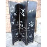 A THREE FOLD LACQUER SCREEN decorated with exotic birds, blossom and foliage, height 184cm width