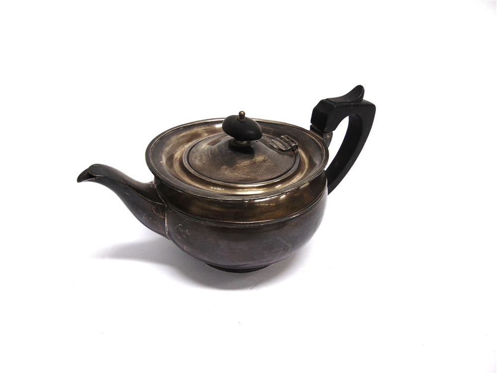 A SILVER TEAPOT by Elkington & Co, Birmingham 1919, in the Georgian style with a cape rim, - Image 2 of 2