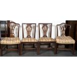 A PAIR OF CHIPPENDALE STYLE DINING CHAIRS with openwork splat backs and drop in seats, and two