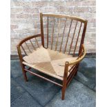 A LARGE OPEN STICKBACK OPEN ARMCHAIR with string seat, unmarked but probably Danish