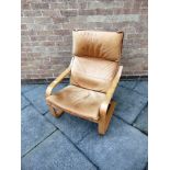 A LAMINATED BEECH BENTWOOD FRAMED ARMCHAIR with leather cushions