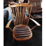 A PAIR OF LIGHT ERCOL STICKBACK WINDSOR ARMCHAIRS the cow-horn shaped yoke 61cm wide 84cm high