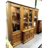 A LARGE ERCOL DISPLAY CABINET/BOOKCASE the upper glazed section with adjustable glass shelves, the