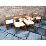 A 1960S EXTENDING TEAK DINING TABLE 168cm long (229cm with additional leaf inserted) 91cm wide;