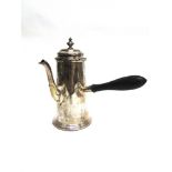 A SILVER COFFEE POT by Martin & Hall, Sheffield1890, of tapering plain form, ebonised wooden side