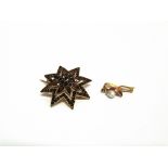 A BOHEMIAN GARNET STARBURST BROOCH 3.7cm across; with a small freshwater pearl and enamel brooch,