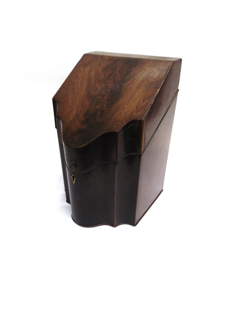 A GEORGE III MAHOGANY KNIFE BOX with serpentine front, later fitted interior, 23cm wide 23cm deep