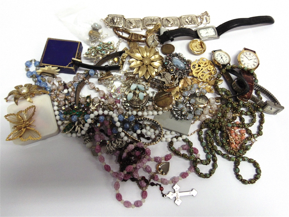 A COLLECTION OF ASSORTED COSTUME JEWELLERY to include beads, paste set items and some silver, also