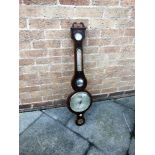 A VICTORIAN MAHOGANY BANJO BAROMETER/HYGROMETER/THERMOMETER the case with broken pediment,