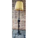 A WROUGHT IRON STANDARD LAMP in the Arts & Crafts style, 180cm high