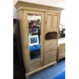 AN EDWARDIAN PAINTED ASH FITTED WARDROBE with mirrored door opening to hanging space above deep