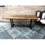 AN OAK REFECTORY STYLE DINING TABLE the heavy rectangular top 198cm long 90cm wide, 75cm high