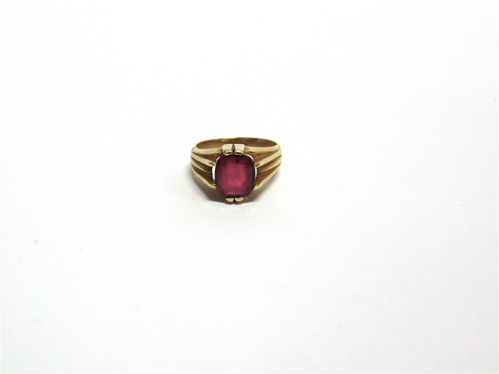A SYNTHETIC RUBY SET RING with Egyptian marks to the outside of the shank, 6.6g gross - Image 2 of 3
