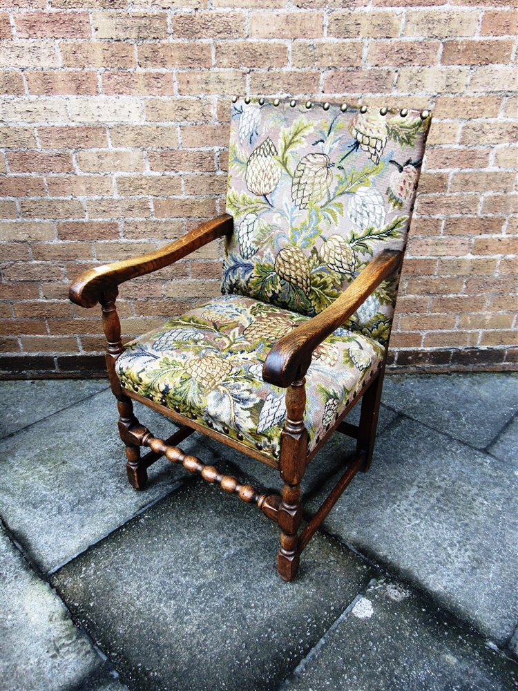 A LARGE OAK FRAMED ARMCHAIR with tapestry upholstery, 58cm wide 64cm deep 106cm high - Image 2 of 2