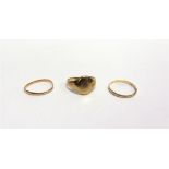 A SIGNET RING with worn marks; and two unmarked wedding rings, 7.1g gross