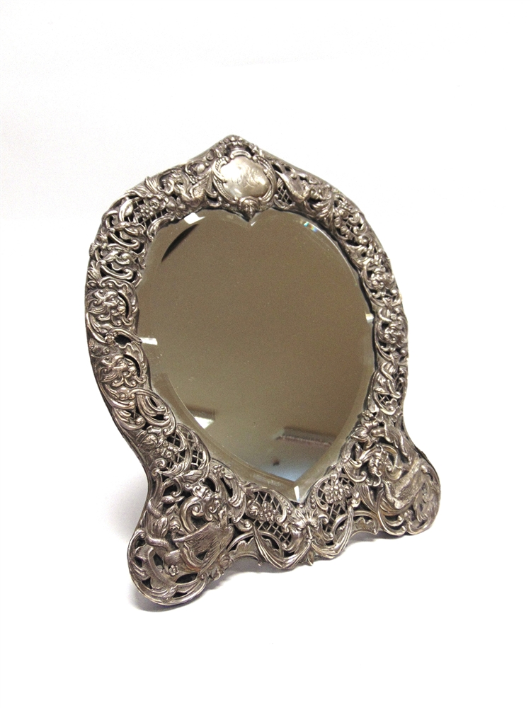 A LATE VICTORIAN SILVER EASEL BACK DRESSING TABLE MIRROR by Gibson & Langman, London 189 , the heart