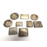 A COLLECTION OF SIX SILVER CIGARETTE CASES and three silver ashtrays; 909g (29.3 troy ozs) gross
