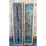 A PAIR OF LEADED AND STAINED GLASS PANELS approx 27cm x 118cm including frames