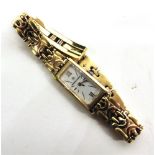 MAURICE LACROIX, A LADY'S GOLD PLATED BRACELET WATCH with box, spare links, and paperwork,