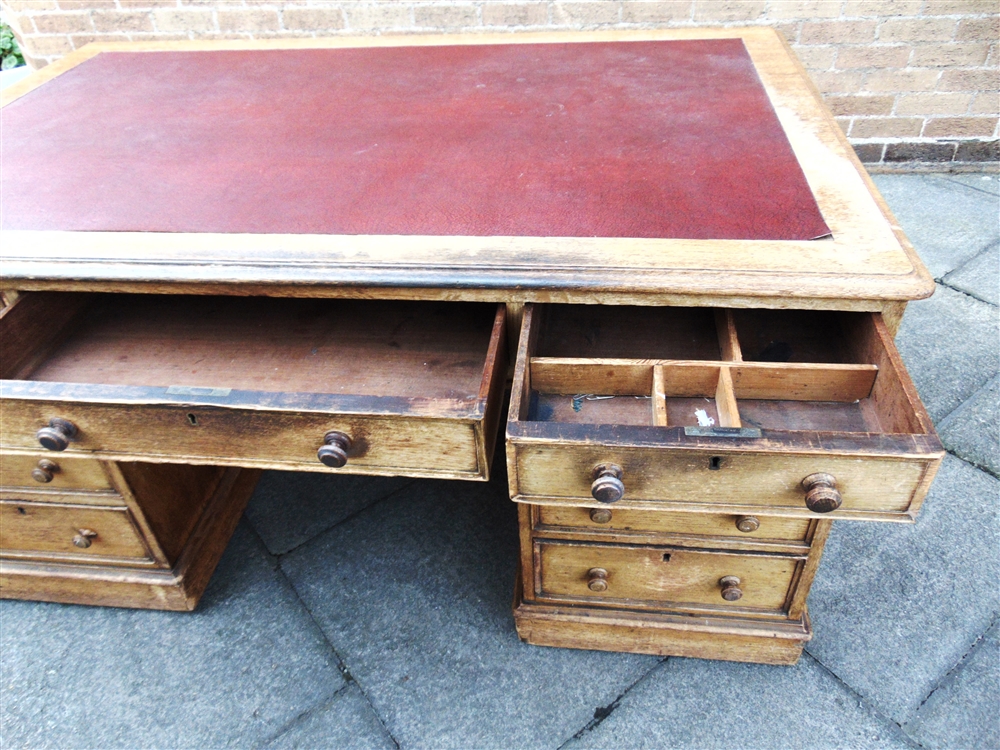 A VICTORIAN OAK PARTNERS DESK the rectangular top with three frieze drawers to each side, on - Image 4 of 9