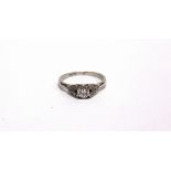 A DIAMOND SINGLE STONE RING stamped 'Plat', the brilliant cut of approximately 0.25 carats,