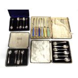 A CASED OF SIX SILVER TEASPOONS a cased set of four silver teaspoons; a set of five silver