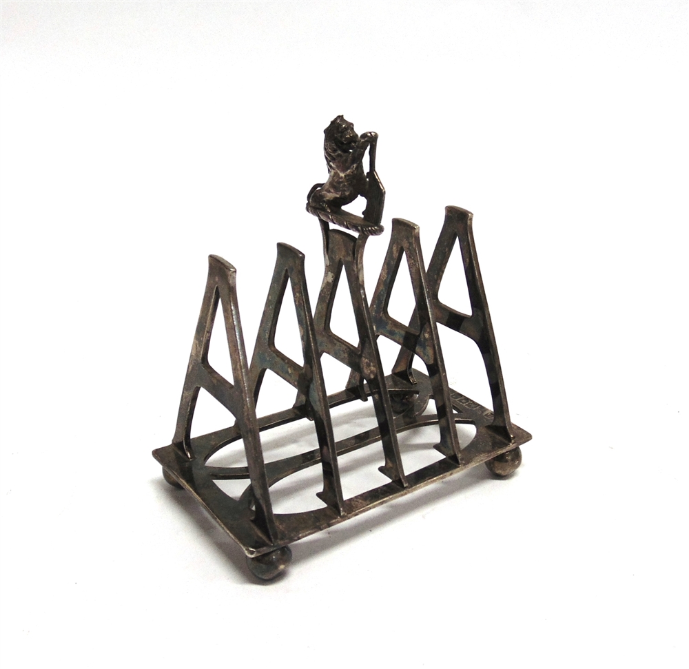 AN UNUSUAL PERSONALISED SILVER TOAST RACK by Fordham & Faulkner, London 1896, each division form