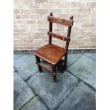 A VICTORIAN MAHOGANY METAMORPHIC LIBRARY CHAIR with double rail back, converting to four tread