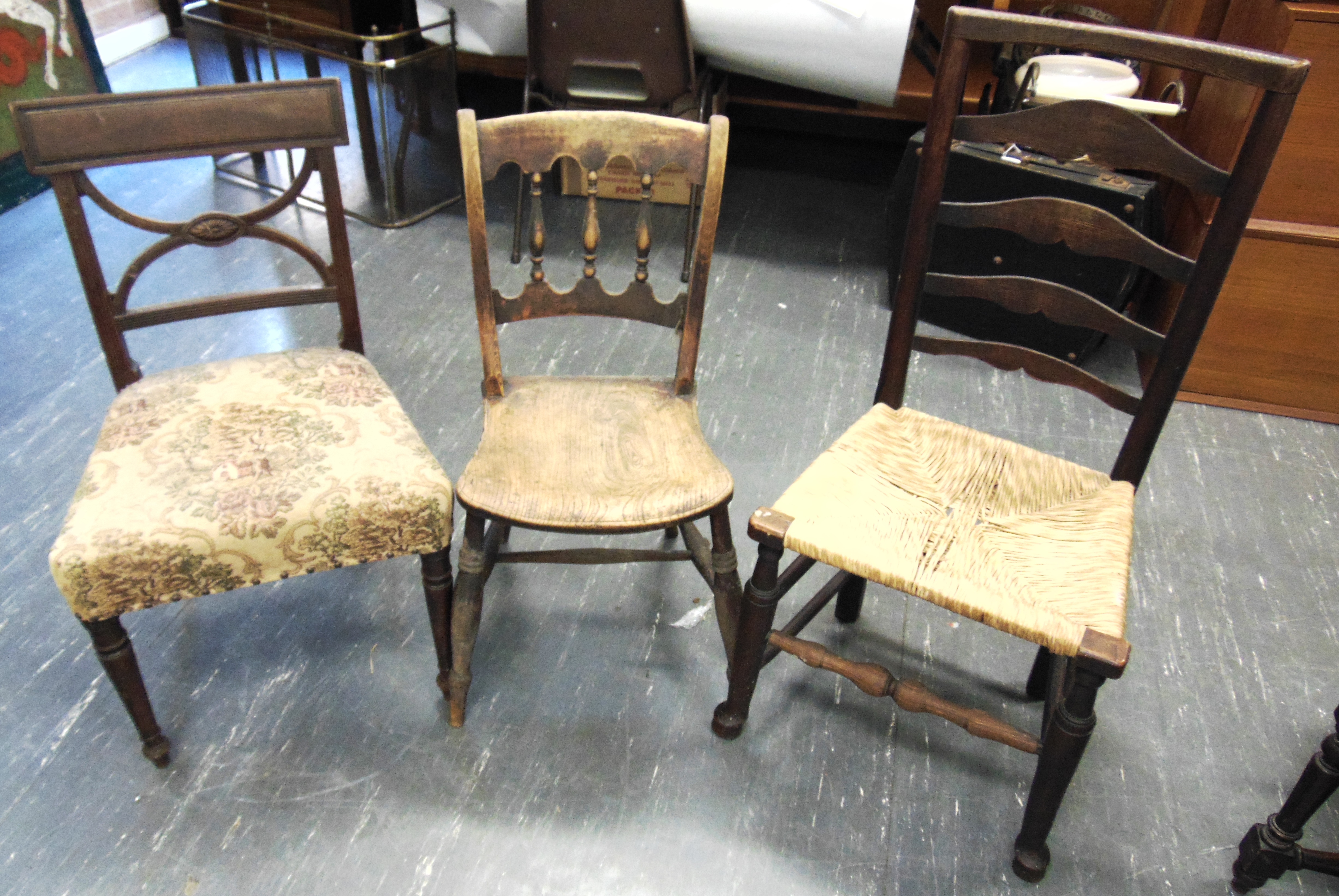 A RUSH SEAT LADDERBACK CHAIR, a single Regency upholstered dining chair and a Windsor kitchen