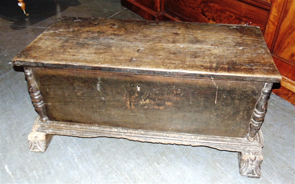 A SIX PLANK FRUITWOOD COFFER probably Continental 17th century and later, carved sledge feet,