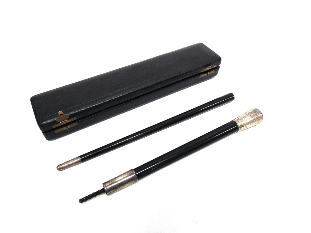 A TWO PIECE EBONY AND SILVER MOUNTED BATON in a presentation case; with another similar baton - Image 3 of 5