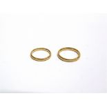 A 22 CARAT GOLD WEDDING RING and another; 6.7g gross