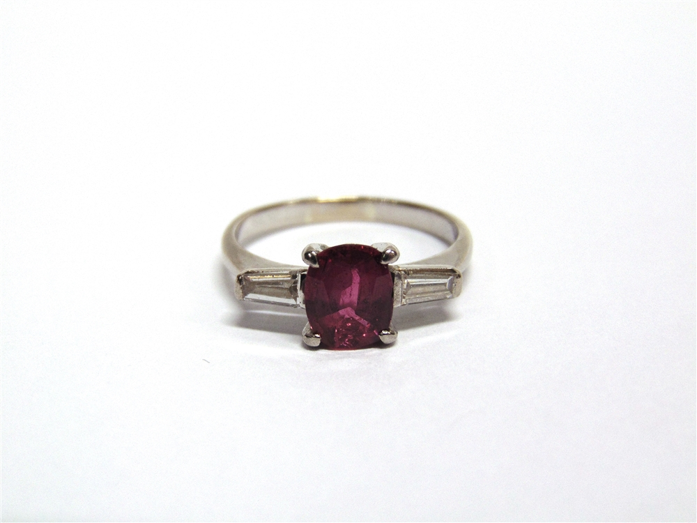 A RUBY AND DIAMOND THREE STONE RING unmarked, the oval cut stone approximately 7.6mm by 6.7mm by 3. - Image 4 of 4