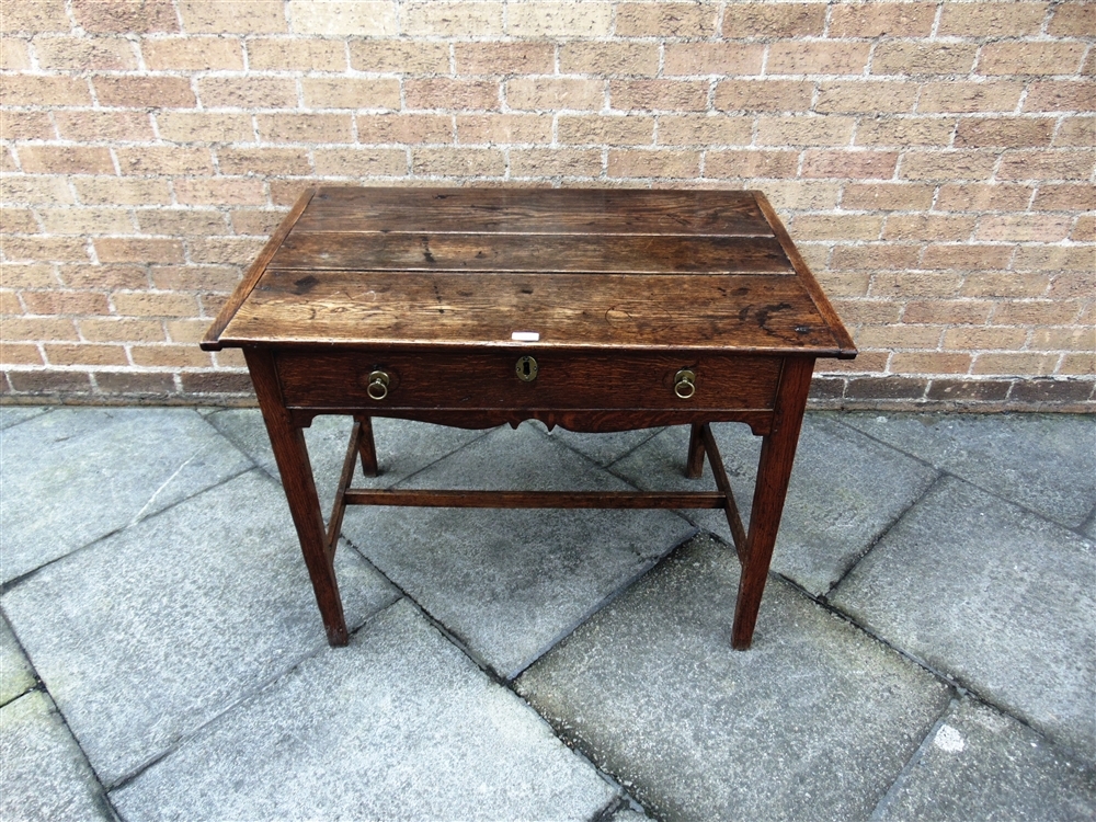 A GEORGE III PROVINCIAL OAK SIDE TABLE with drawer to frieze, 95cm wide 64cm deep 72cm high