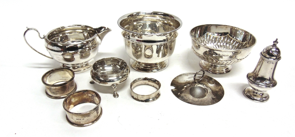 A SILVER BOWL by Edward Viner; a silver bowl by Martin & Hall of Sheffield; a silver cream jug; a