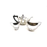 A LATE VICTORIAN THREE PIECE TEA SERVICE London 1894, of traditional oval gadrooned form, 495g (15.9